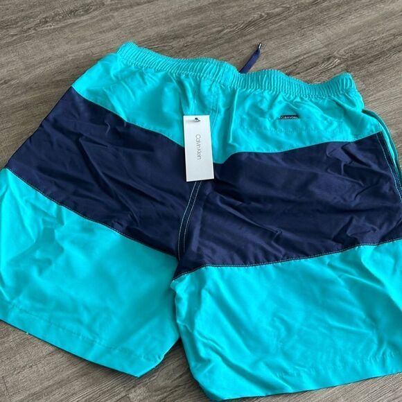 Calvin Klein
Men's Colorblocked 7" Swim Trunks - Picture 2 of 2
